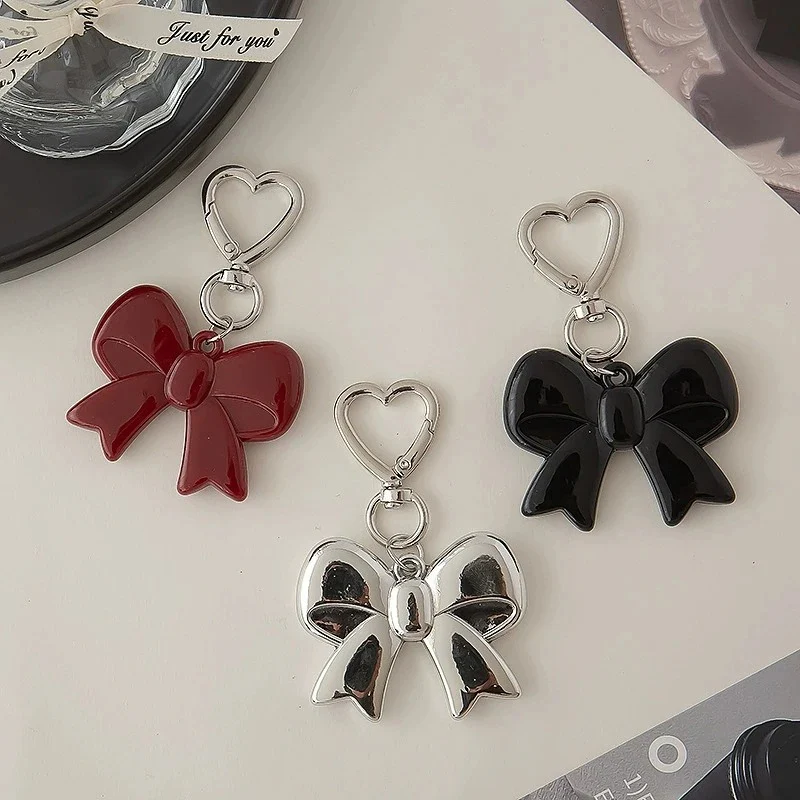 Handmade Glossy Black Bow Keychain with Heart Clasp - Image 3