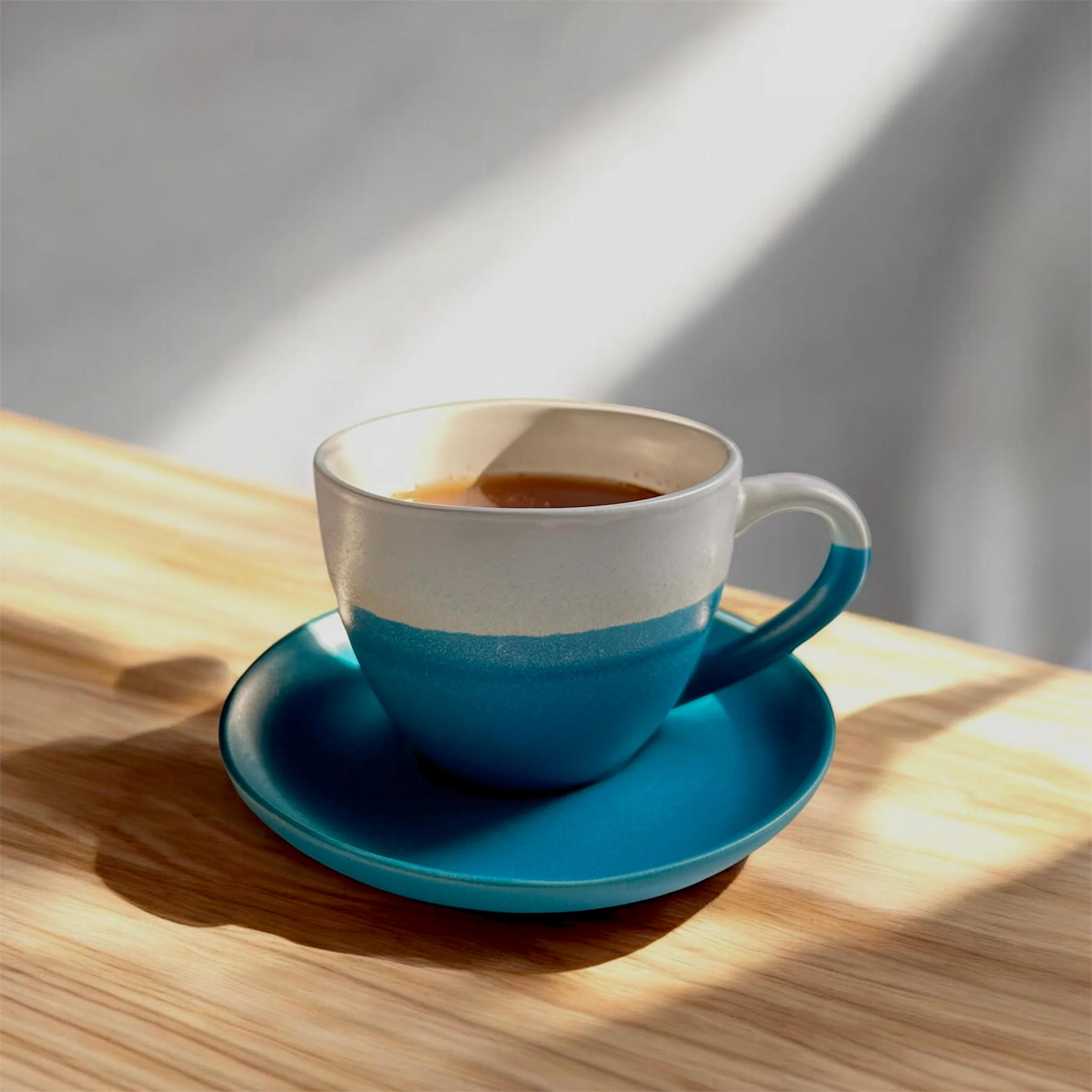 Minimalist Ceramic Coffee Cup with Saucer - Image 8